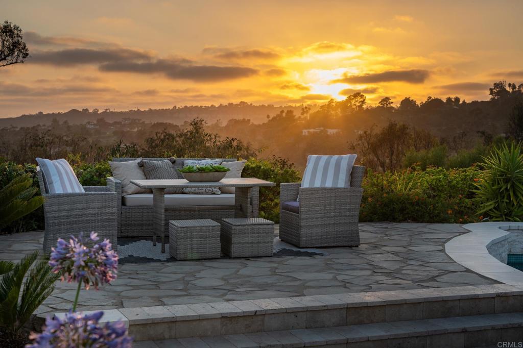 5002 El Acebo Rancho Santa Fe, CA 92067 - Photo 6 of 55 a view of a terrace with couches and sky view