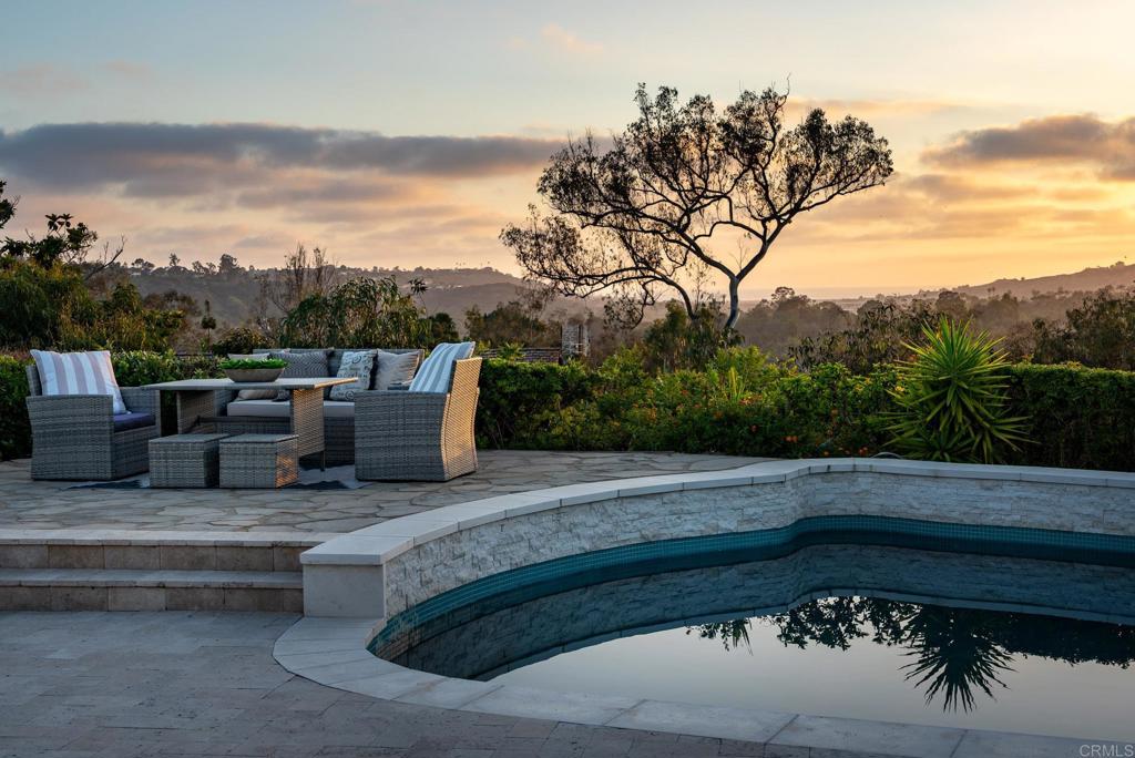 5002 El Acebo Rancho Santa Fe, CA 92067 - Photo 8 of 55 a view of a terrace with a bench