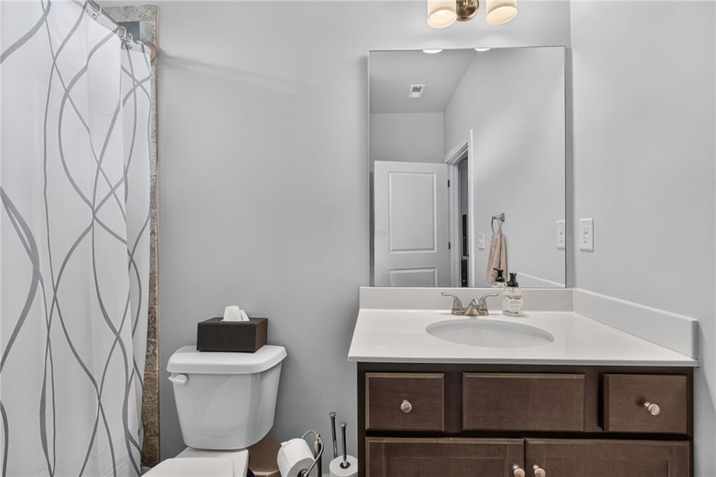 139 Manchester Lane Villa Rica, GA 30180 - Photo 24 of 60 a bathroom with a sink and a toilet