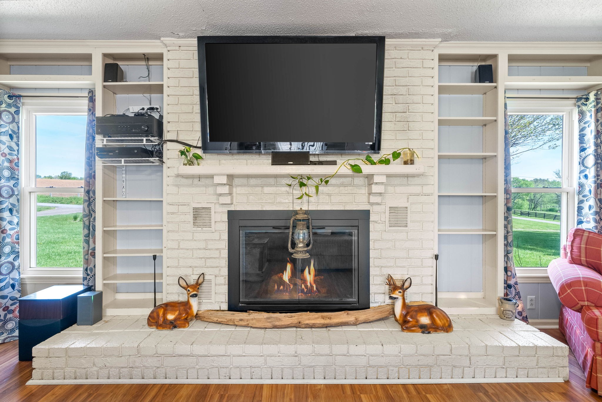 558 Bumpus Road Cunningham, TN 37052 - Photo 11 of 64 a fireplace with a sink and a fireplace