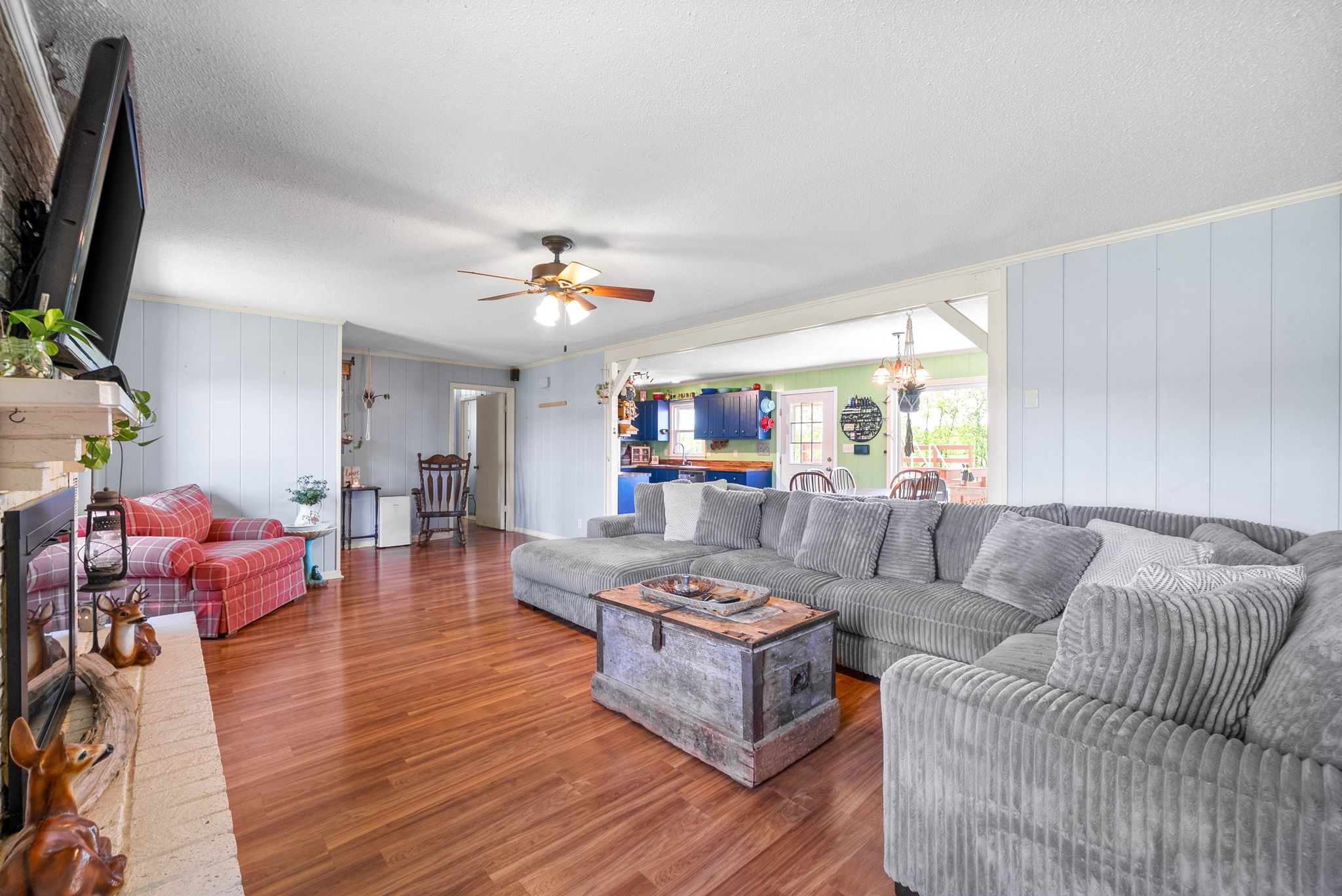 558 Bumpus Road Cunningham, TN 37052 - Photo 13 of 64 a living room with furniture and a flat screen tv