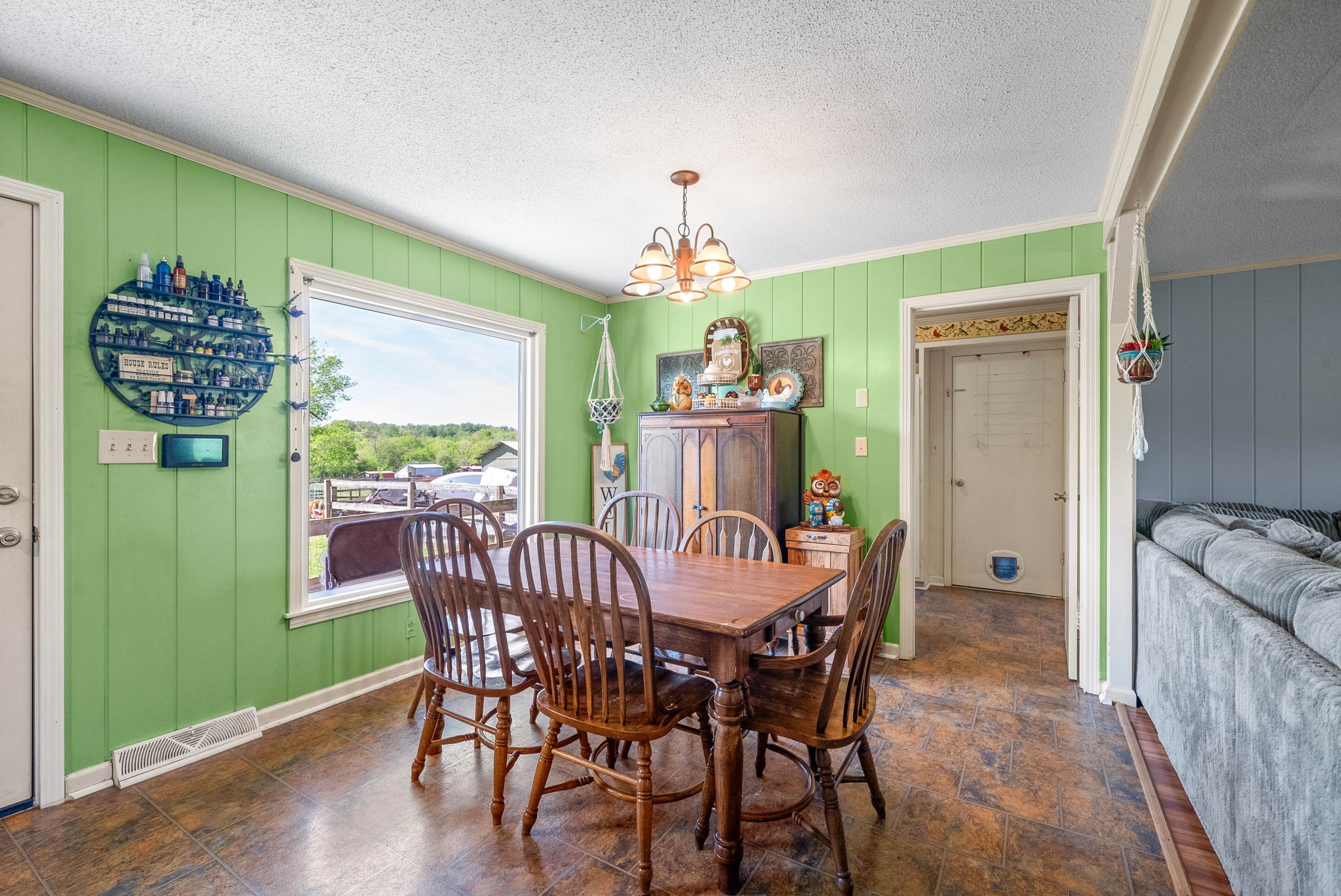 558 Bumpus Road Cunningham, TN 37052 - Photo 20 of 64 a view of a dining room with furniture window and outside view