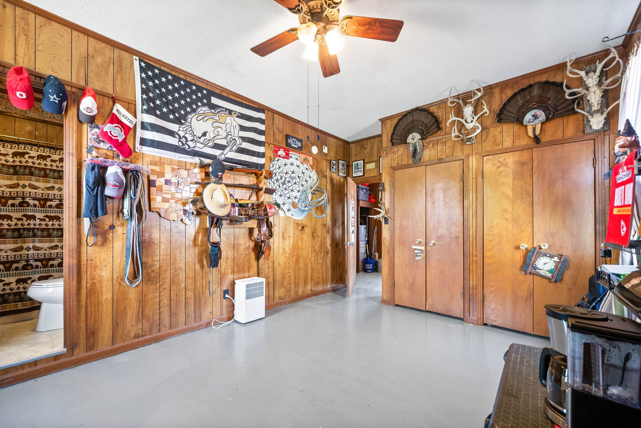 558 Bumpus Road Cunningham, TN 37052 - Photo 27 of 64 a view of hallway with furniture and a chandelier