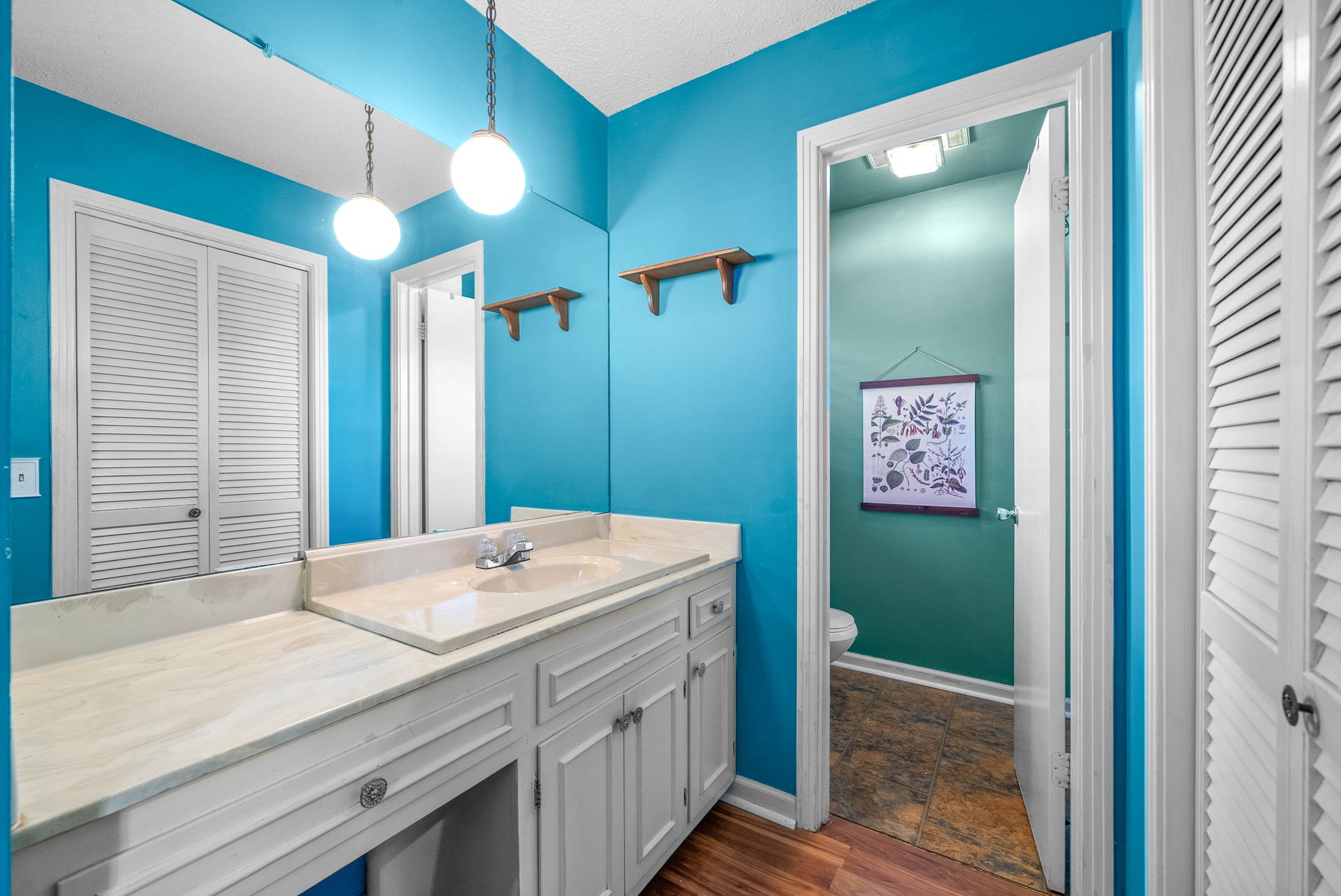 558 Bumpus Road Cunningham, TN 37052 - Photo 31 of 64 a bathroom with a sink a mirror and a shower