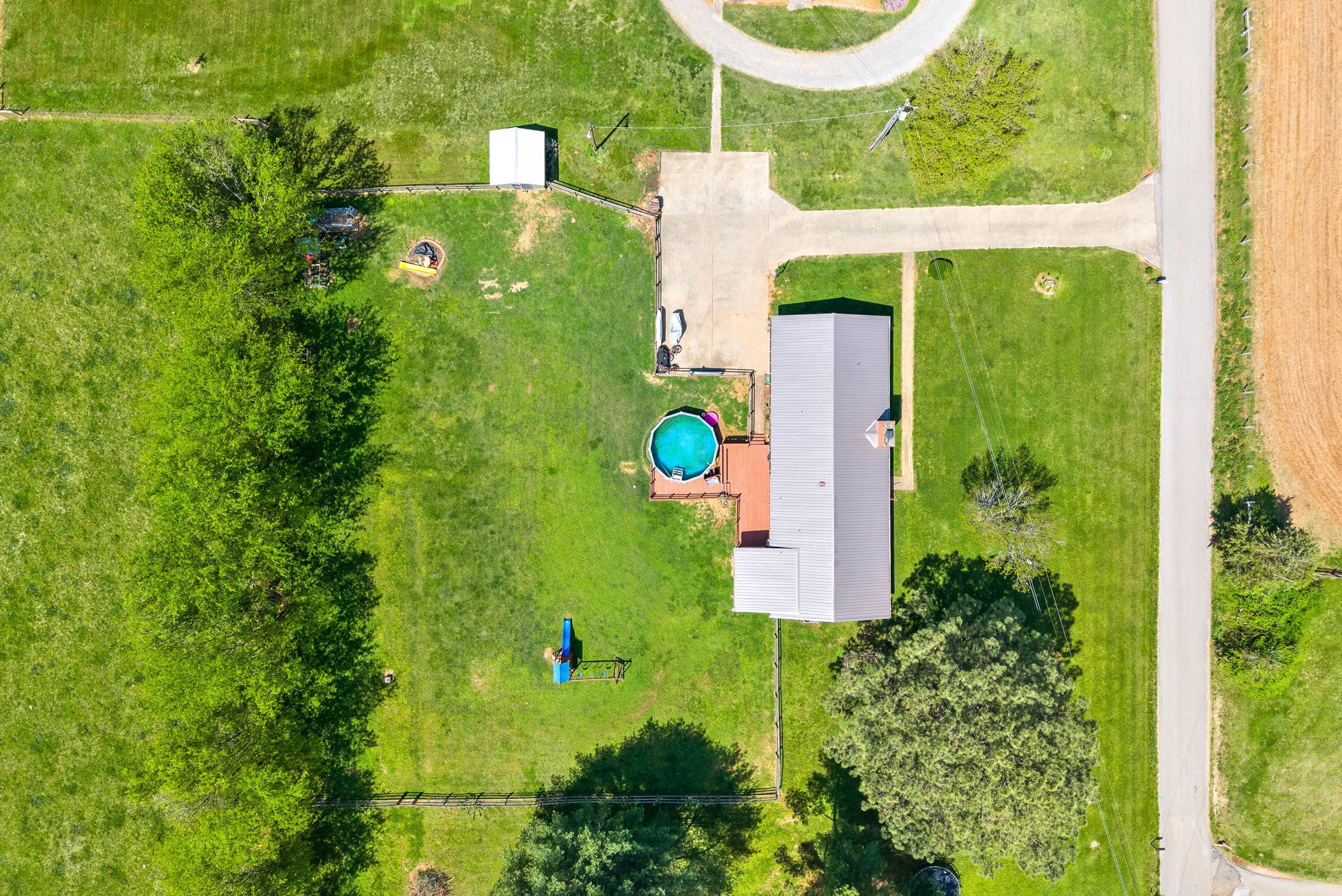 558 Bumpus Road Cunningham, TN 37052 - Photo 43 of 64 a green field with some trees in the background