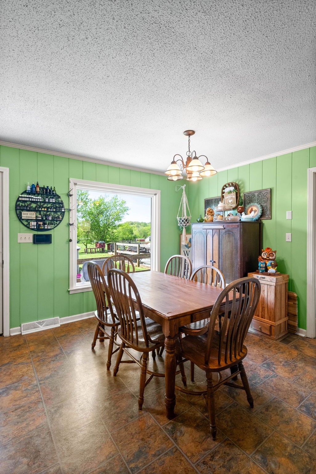 558 Bumpus Road Cunningham, TN 37052 - Photo 56 of 64 a view of a dining room with furniture window and outside view