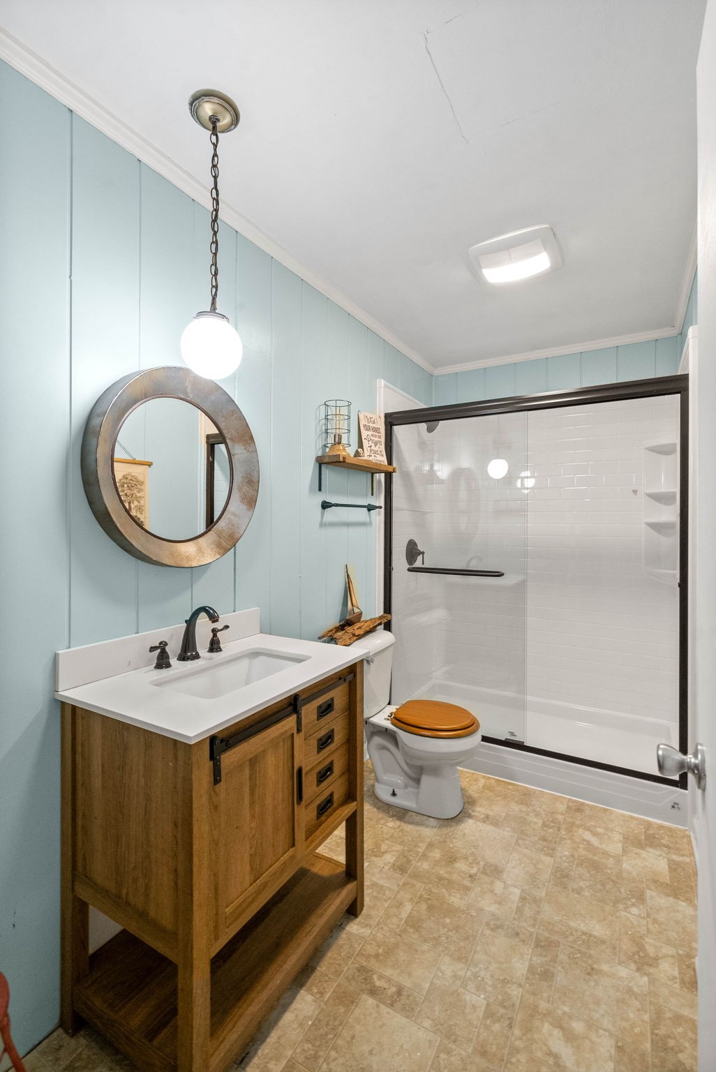 558 Bumpus Road Cunningham, TN 37052 - Photo 57 of 64 a bathroom with a toilet a sink and a mirror