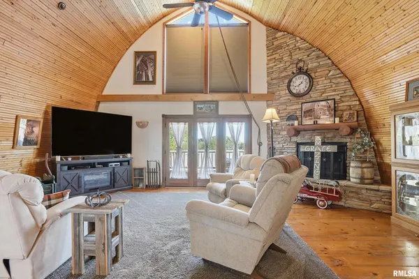 a view of balcony with chair and wooden floor