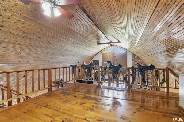 a kitchen with stainless steel appliances granite countertop a refrigerator a stove and a sink