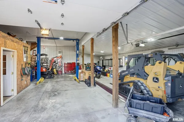 a view of an empty room with a birdcage