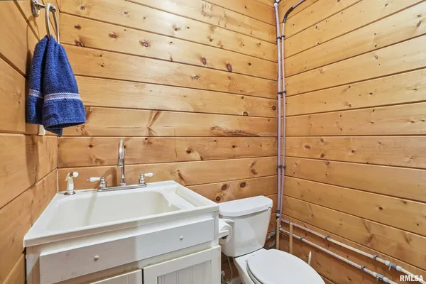 a view of a patio with wooden floor