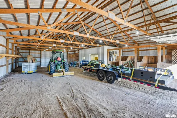 a view of a house with a wooden fence