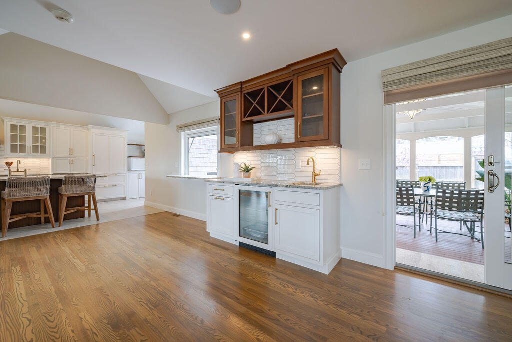 39 Bay Shore Road Hyannis, MA 02601 - Photo 15 of 63 a open kitchen with stainless steel appliances granite countertop a stove and cabinets with wooden floor