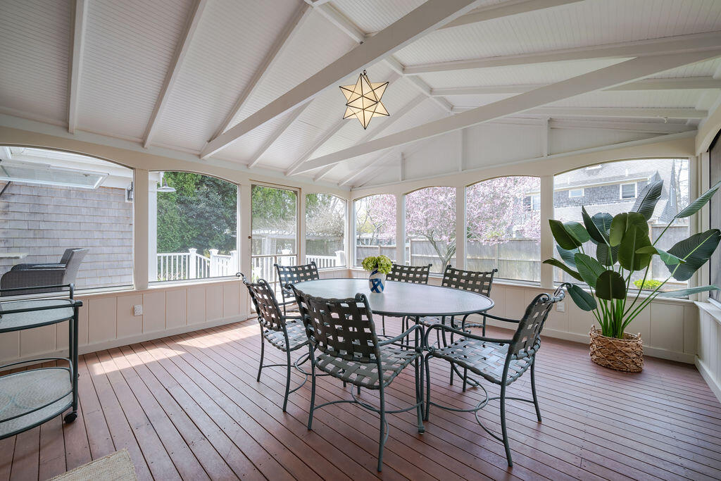 39 Bay Shore Road Hyannis, MA 02601 - Photo 17 of 63 a view of a dining room with furniture window and wooden floor