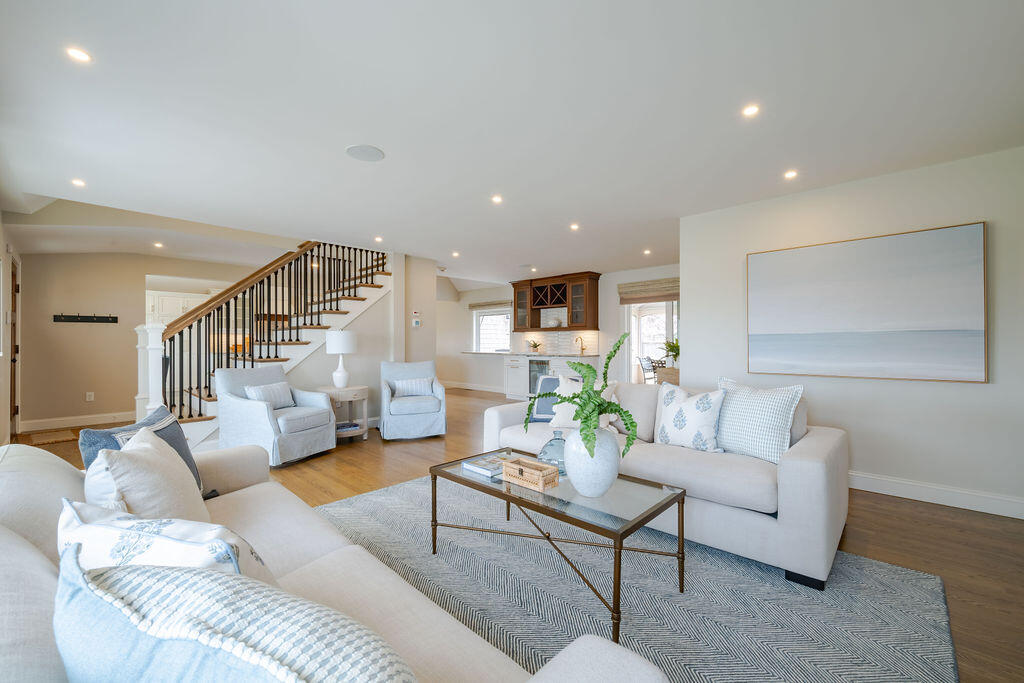 39 Bay Shore Road Hyannis, MA 02601 - Photo 23 of 63 a living room with furniture and wooden floor