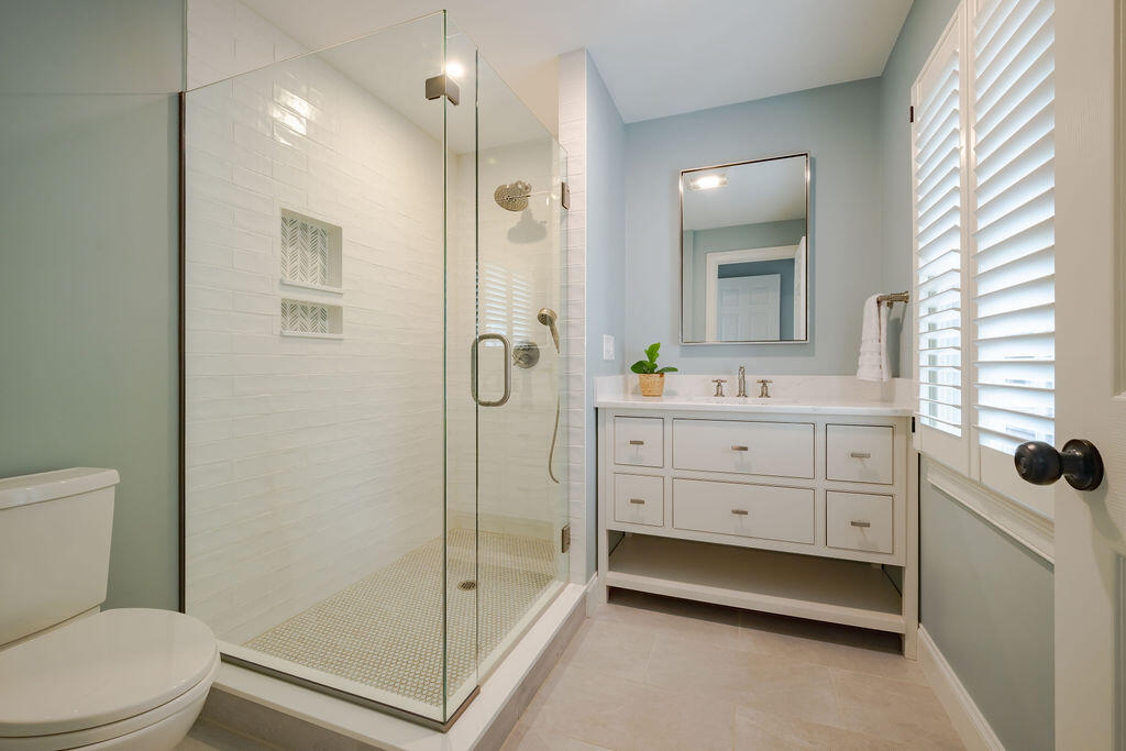 39 Bay Shore Road Hyannis, MA 02601 - Photo 29 of 63 a bathroom with a sink a toilet and shower