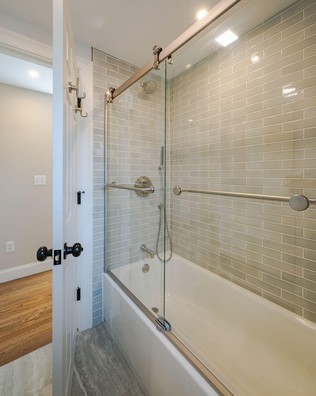 39 Bay Shore Road Hyannis, MA 02601 - Photo 36 of 63 a bathroom with a bathtub and a shower