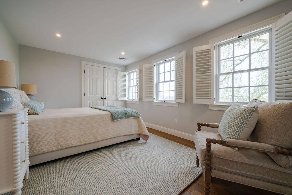 39 Bay Shore Road Hyannis, MA 02601 - Photo 38 of 63 a bed room with a bed and a couch