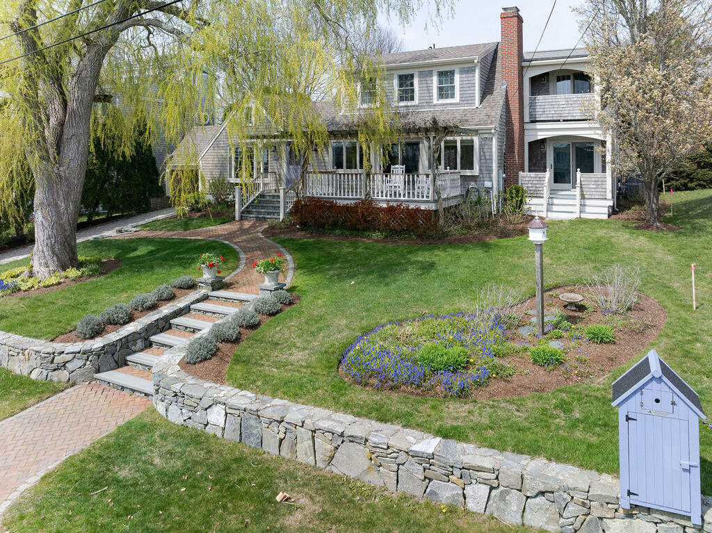 39 Bay Shore Road Hyannis, MA 02601 - Photo 41 of 63 a front view of house with yard and green space