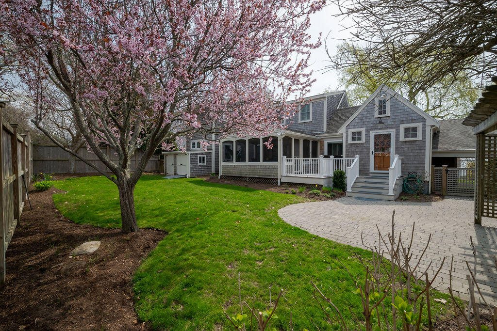 39 Bay Shore Road Hyannis, MA 02601 - Photo 5 of 63 front view of a house with a yard