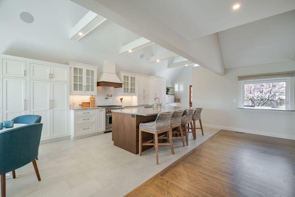 39 Bay Shore Road Hyannis, MA 02601 - Photo 9 of 63 a living room with stainless steel appliances kitchen island granite countertop furniture and wooden floor