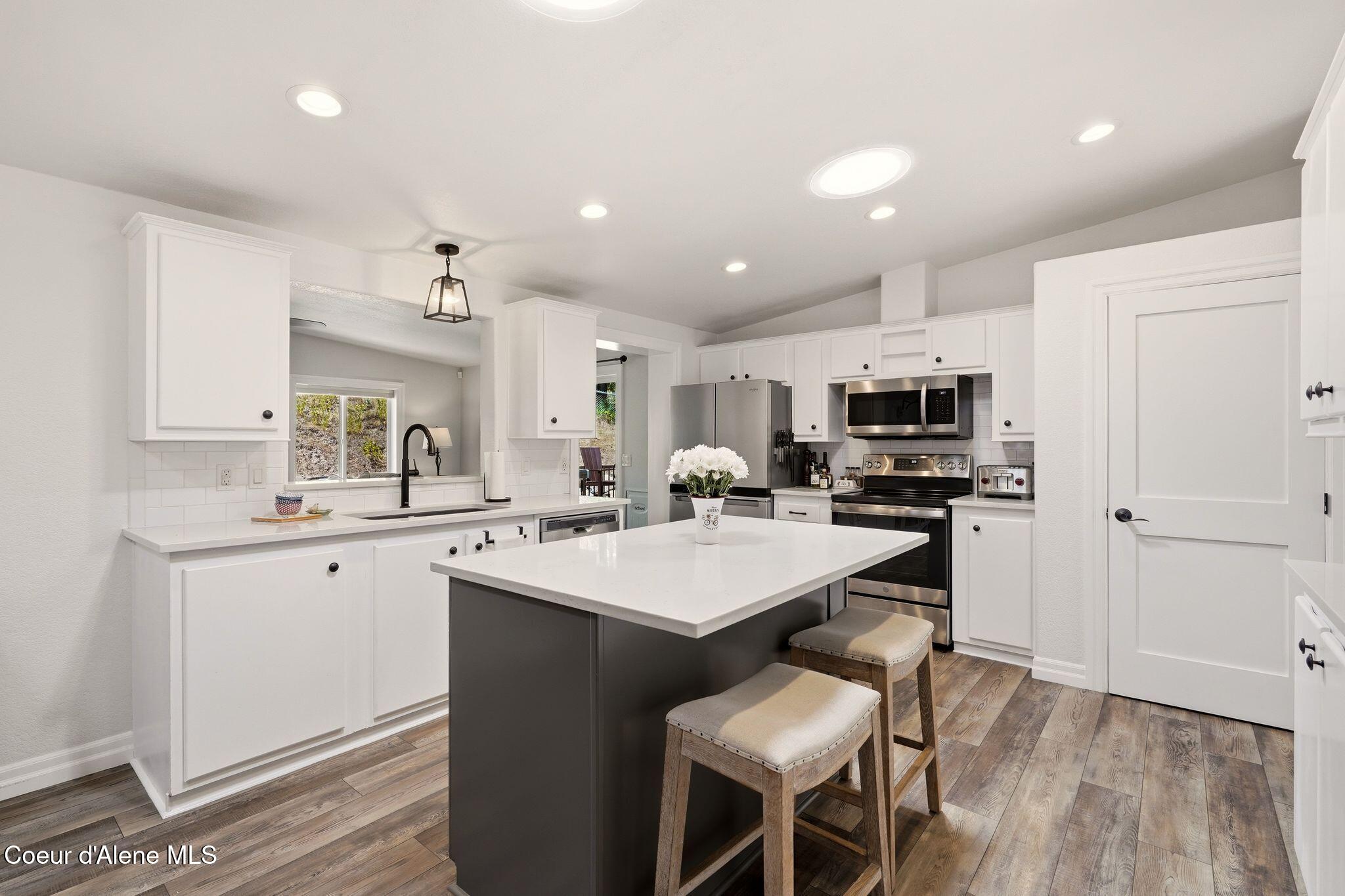 10439 West Cougar Gulch Road Coeur D'Alene, ID 83814 - Photo 101 of 128 Island Kitchen at the Ridge House