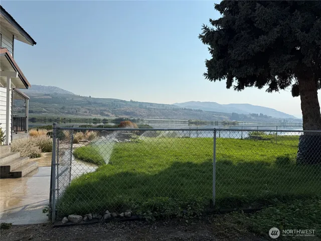 a view of a backyard of a house