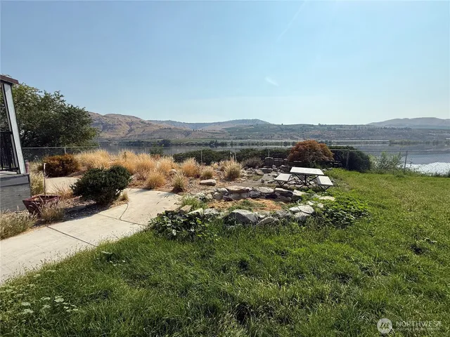 a view of a lake with mountains in the background
