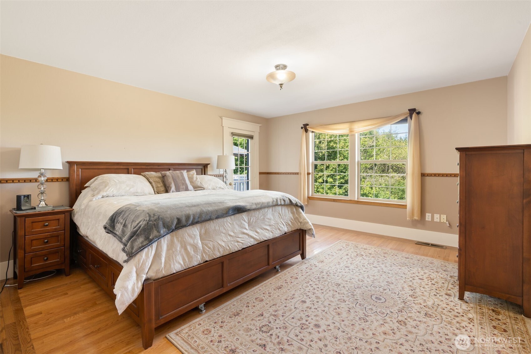 308 Brockway Road Chehalis, WA 98532 - Photo 18 of 40 a bedroom with a large bed and a large window