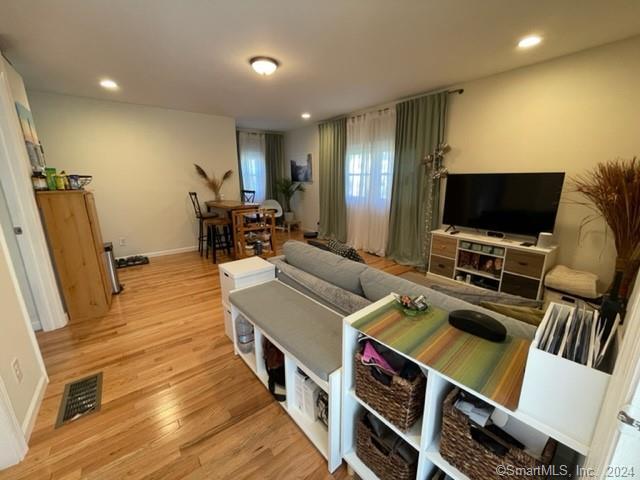 86 Pocahontas Road Redding, CT 06896 - Photo 12 of 23 a room with furniture and a flat screen tv