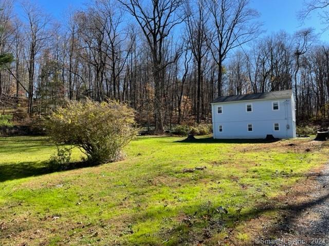 86 Pocahontas Road Redding, CT 06896 - Photo 16 of 23 a view of a swimming pool with an outdoor space