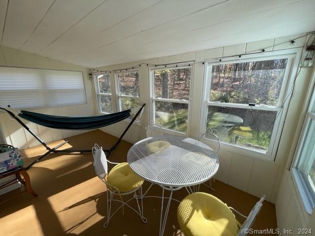 86 Pocahontas Road Redding, CT 06896 - Photo 2 of 23 a dining room with furniture and wooden floor