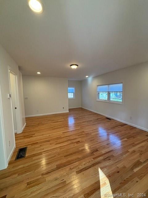 86 Pocahontas Road Redding, CT 06896 - Photo 3 of 23 a view of empty room with wooden floor