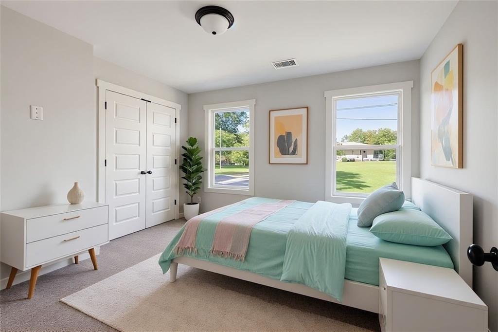 205 Pinecrest Road Cedartown, GA 30125 - Photo 21 of 27 a bedroom with a bed and a window