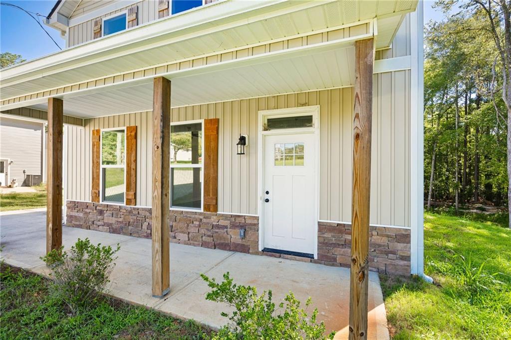 205 Pinecrest Road Cedartown, GA 30125 - Photo 6 of 27 a front view of a house with a porch