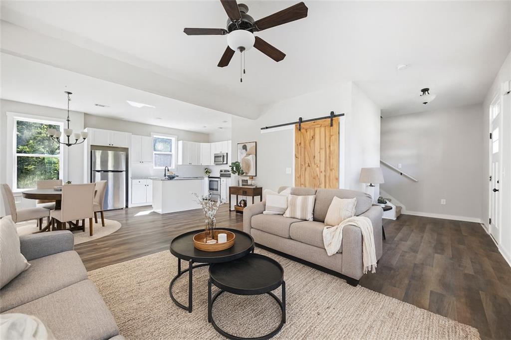 205 Pinecrest Road Cedartown, GA 30125 - Photo 8 of 27 a living room with furniture and a large window