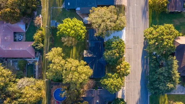 a view of swimming pool with outdoor seating and yard