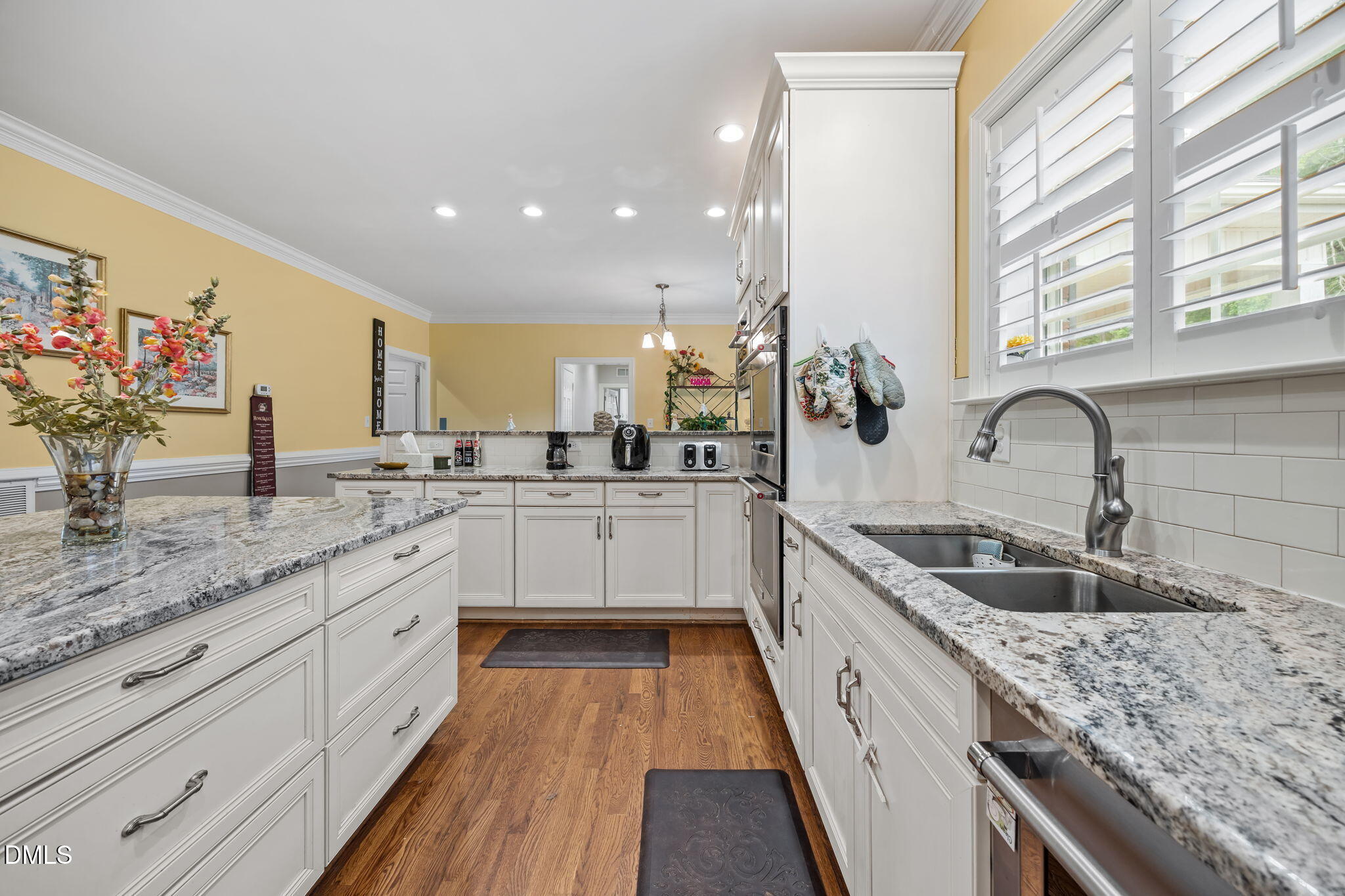 2880 Elevation Road Four Oaks, NC 27524 - Photo 17 of 51 a large kitchen with a lot of counter space and a sink