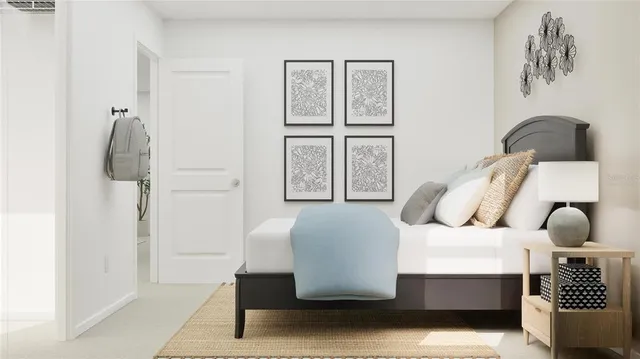 a bedroom with a bed and window