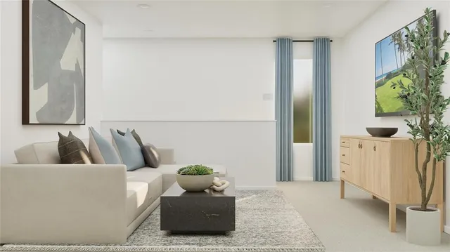 a living room with furniture and a potted plant