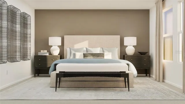 a bedroom with a bed and window