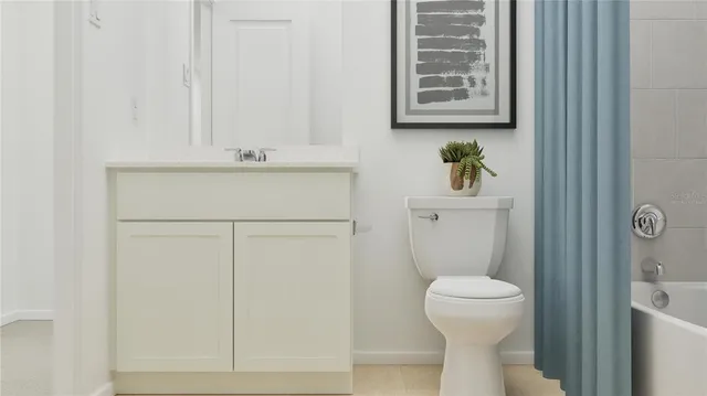 a bathroom with a toilet a sink and a shower