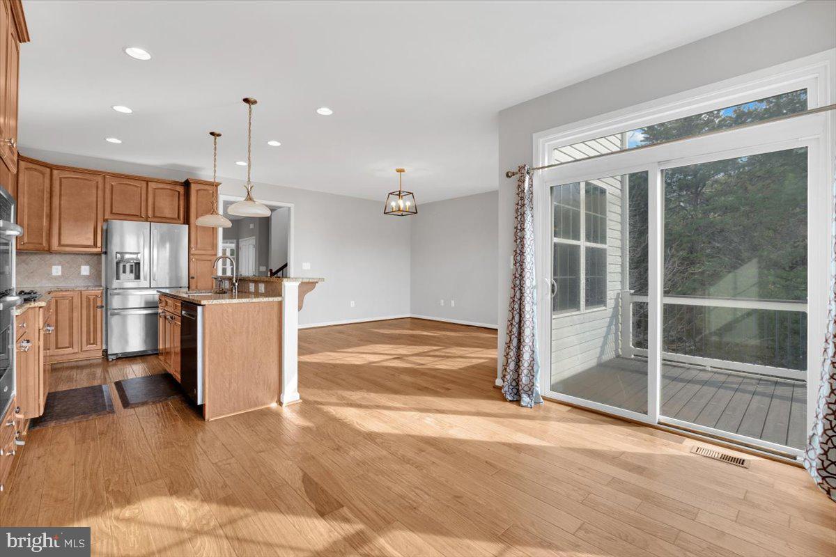 41625 Broxbourne Terrace Aldie, VA 20105 - Photo 28 of 43 a view of kitchen with furniture and refrigerator