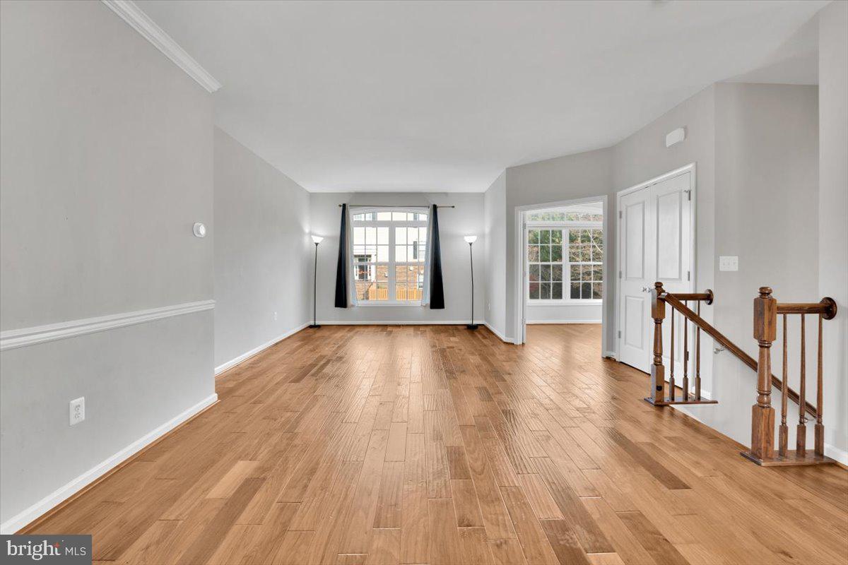 41625 Broxbourne Terrace Aldie, VA 20105 - Photo 32 of 43 wooden floor in an empty room with a window