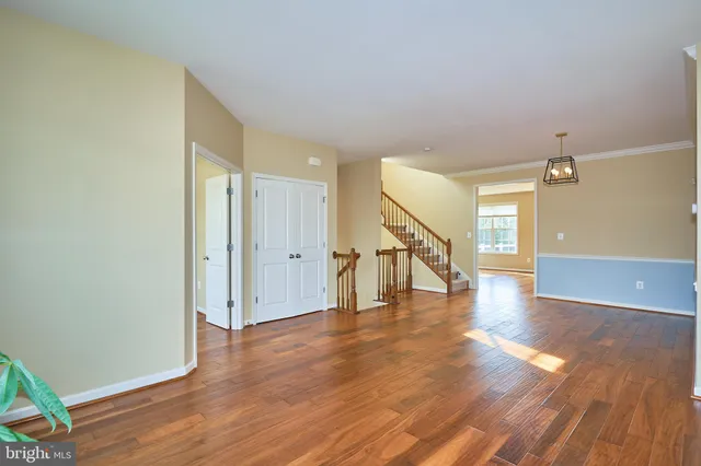 a view of entryway with wooden floor