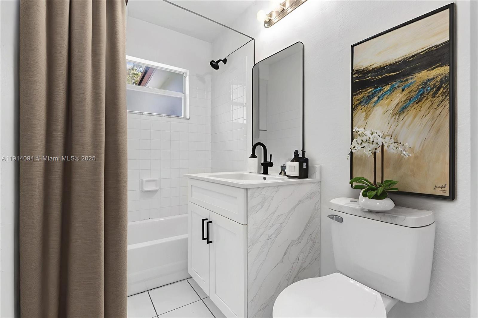 5713 Seton Drive Margate, FL 33063 - Photo 20 of 33 a bathroom with a sink toilet and shower