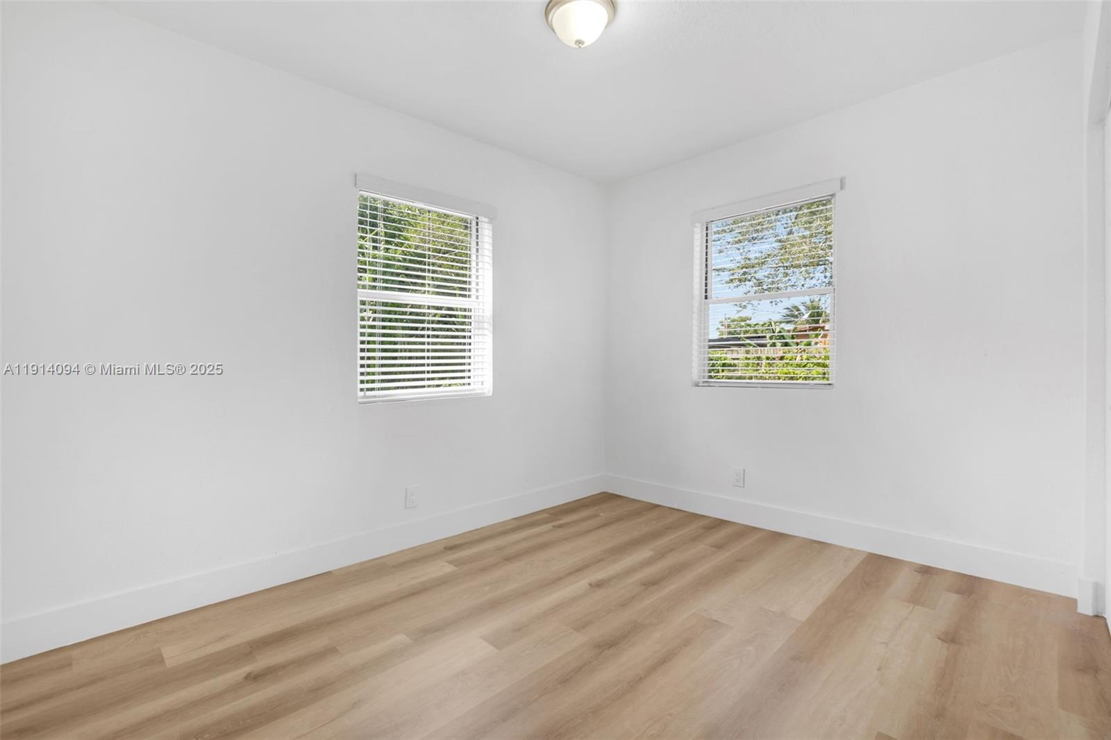 5713 Seton Drive Margate, FL 33063 - Photo 25 of 33 a view of an empty room with a window