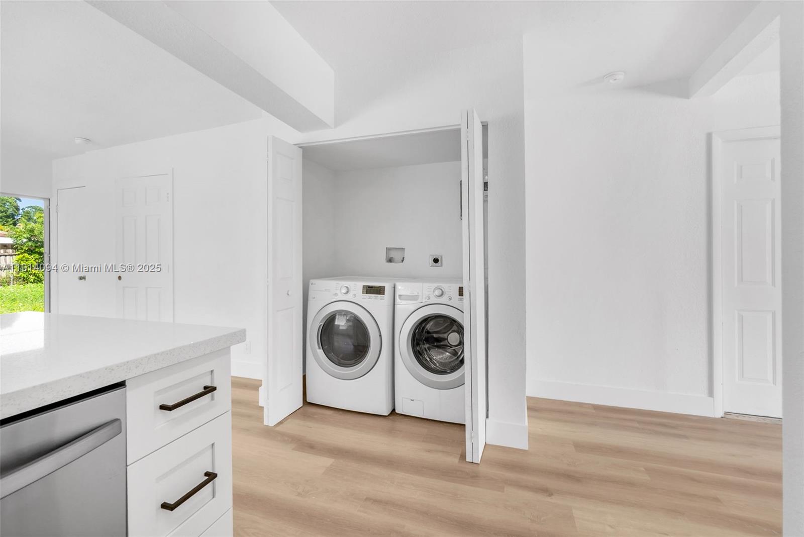 5713 Seton Drive Margate, FL 33063 - Photo 27 of 33 a utility room with sink dryer and washer