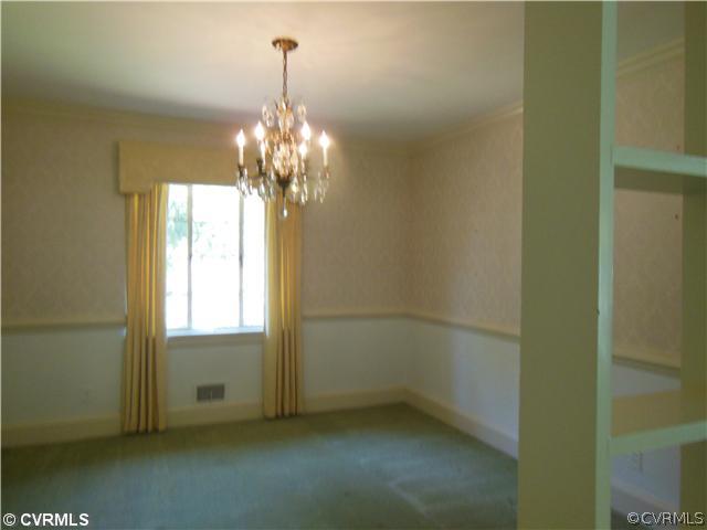 8010 Cameron Road Richmond, VA 23229 - Photo 5 of 14 a view of a chandelier in big room and chandelier