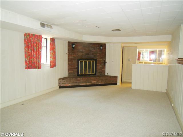 8010 Cameron Road Richmond, VA 23229 - Photo 8 of 14 an empty room with windows